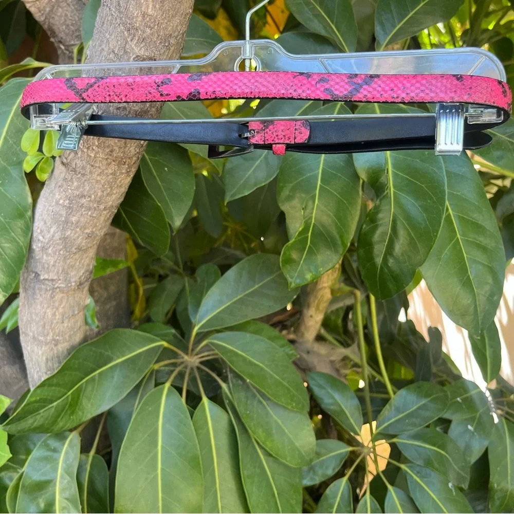 Vintage WCM New York snakeskin / python belt in pink and black.